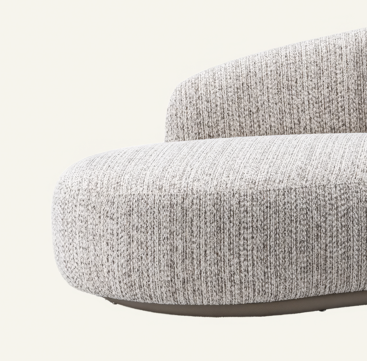 The Varenna Sofa, close-up of the grey woven fabric and curved plinth