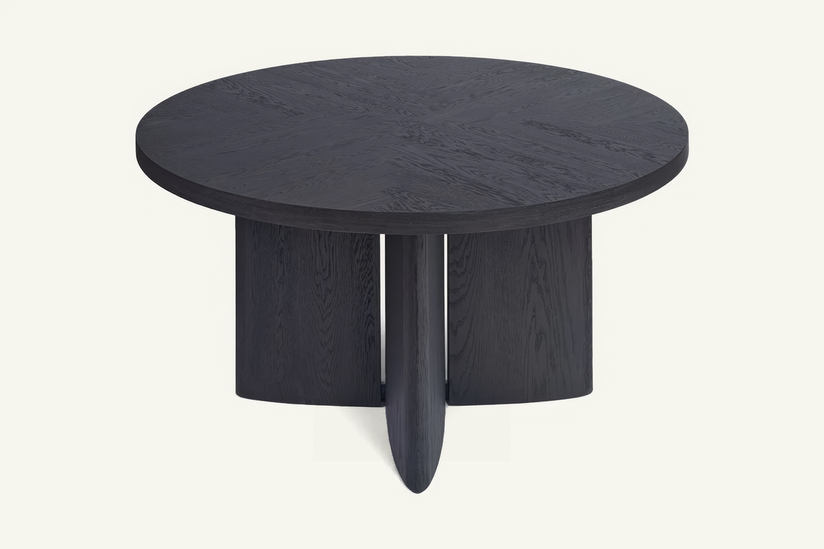 The Vinci Black Oak Round Dining Table, angled view
