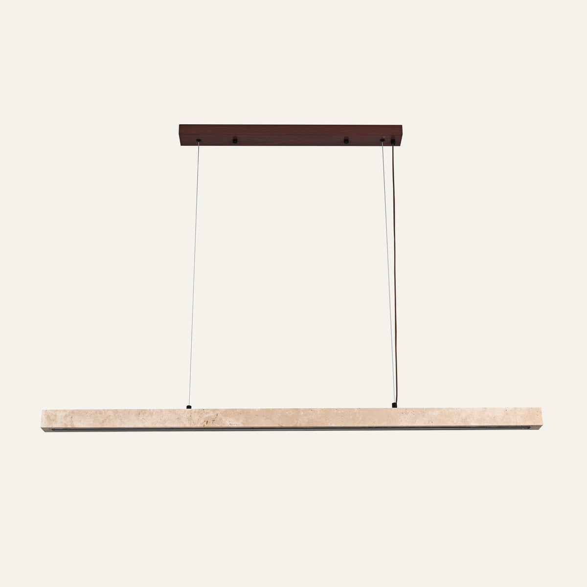 The Traversa travertine pendant light, L120cm, on a walnut canopy