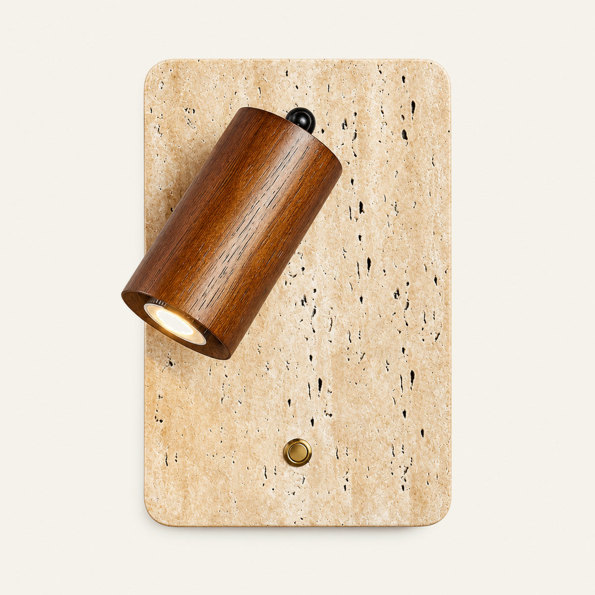 The Vassoio travertine wall light with a walnut spotlight