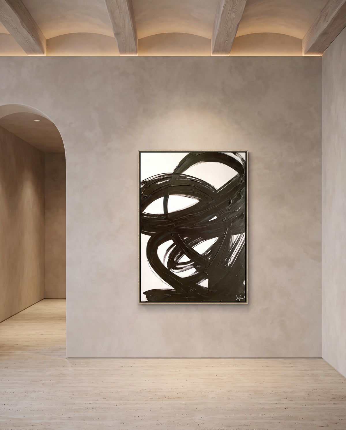 Virella canvas artwork in an oak frame on a plaster wall