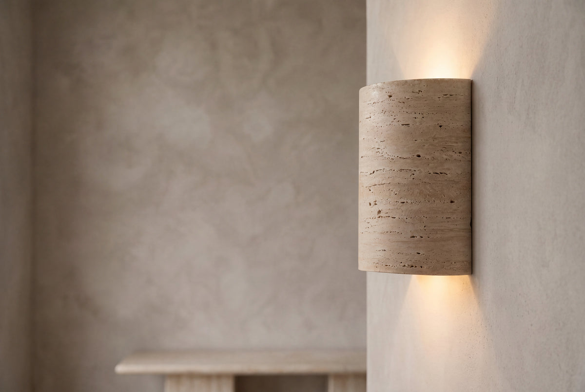 The Volta Travertine Wall Light, lifestyle close-up